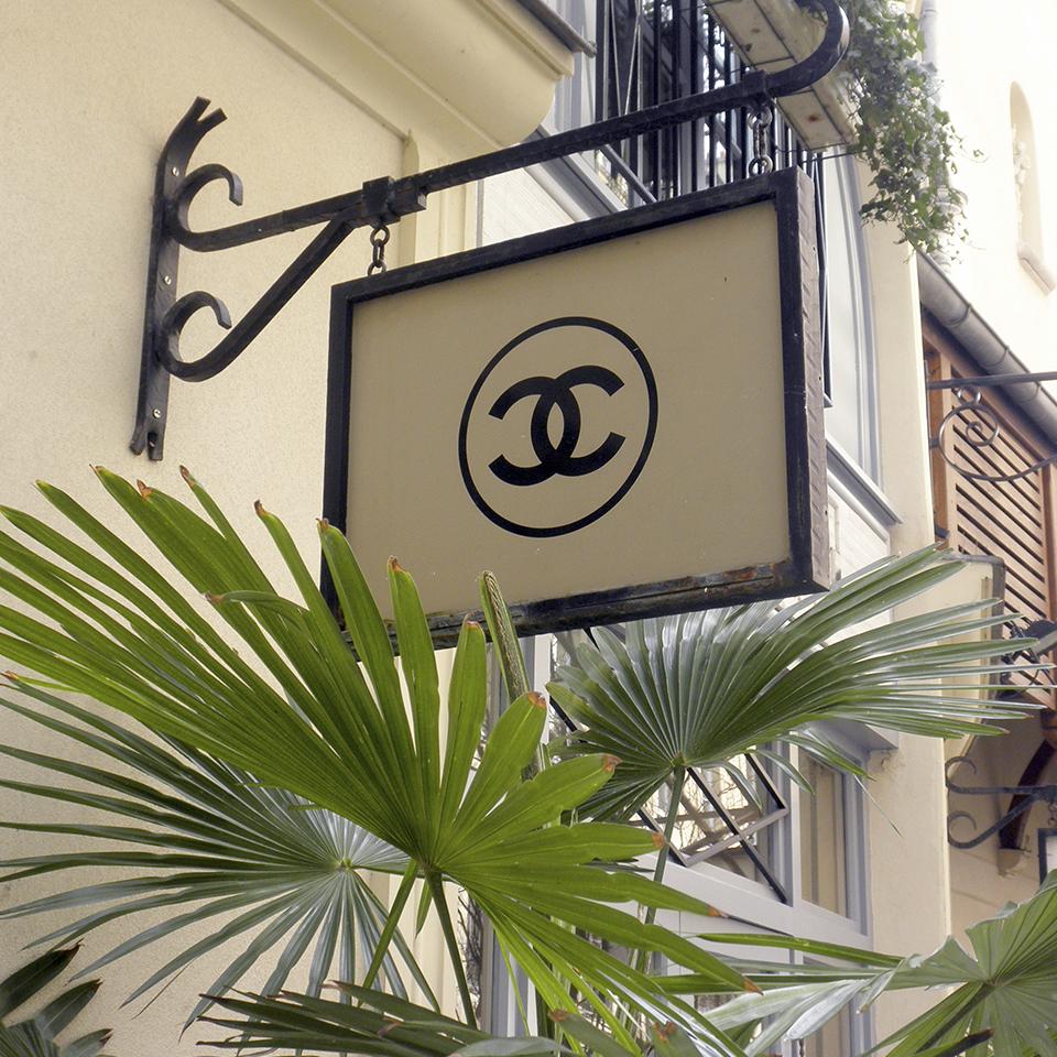 Suspended Chanel store sign by Visotec