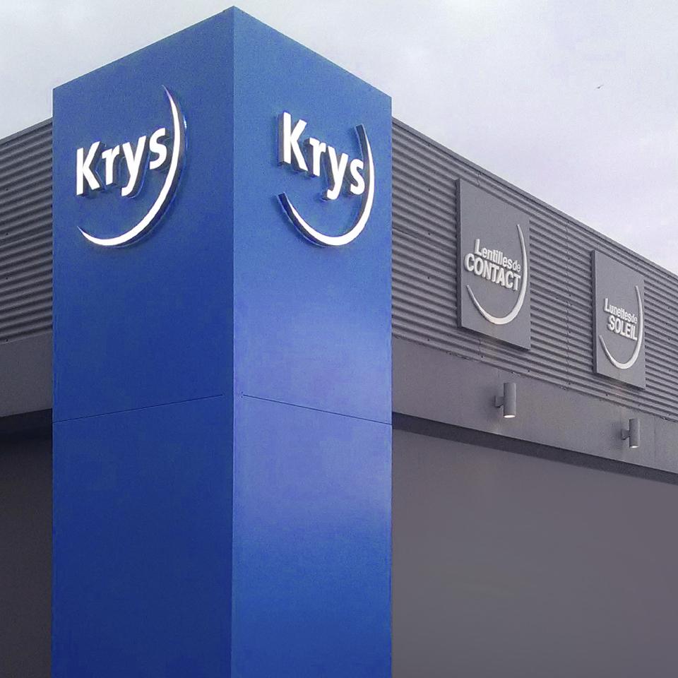 Krys signalétique architecturale de magasin par Visotec