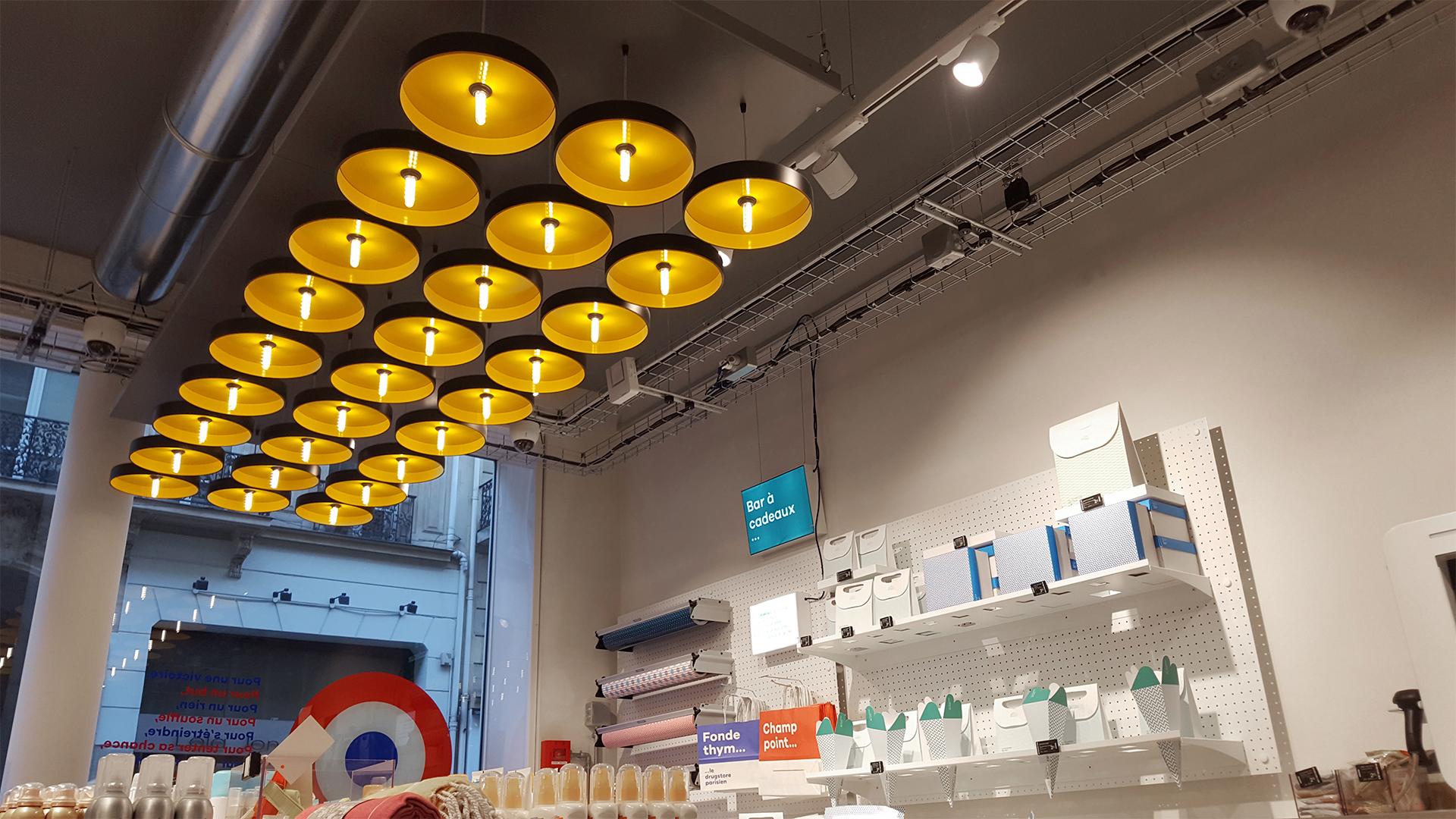 Le Drugstore Parisien - éclairage intérieur par Visotec